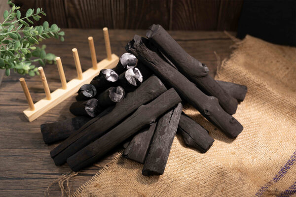 Using mangrove wood to make charcoal