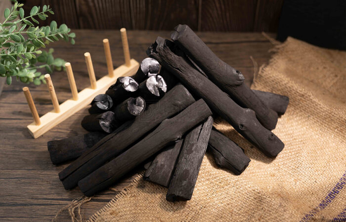 Using mangrove wood to make charcoal