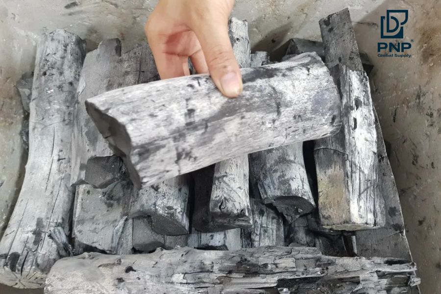 The outside of the charcoal is usually white or silver-grey while the inside is black