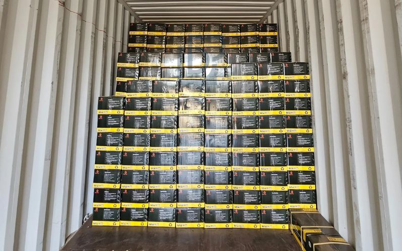 Boxes of high-quality sawdust briquette charcoal are properly loaded in a container