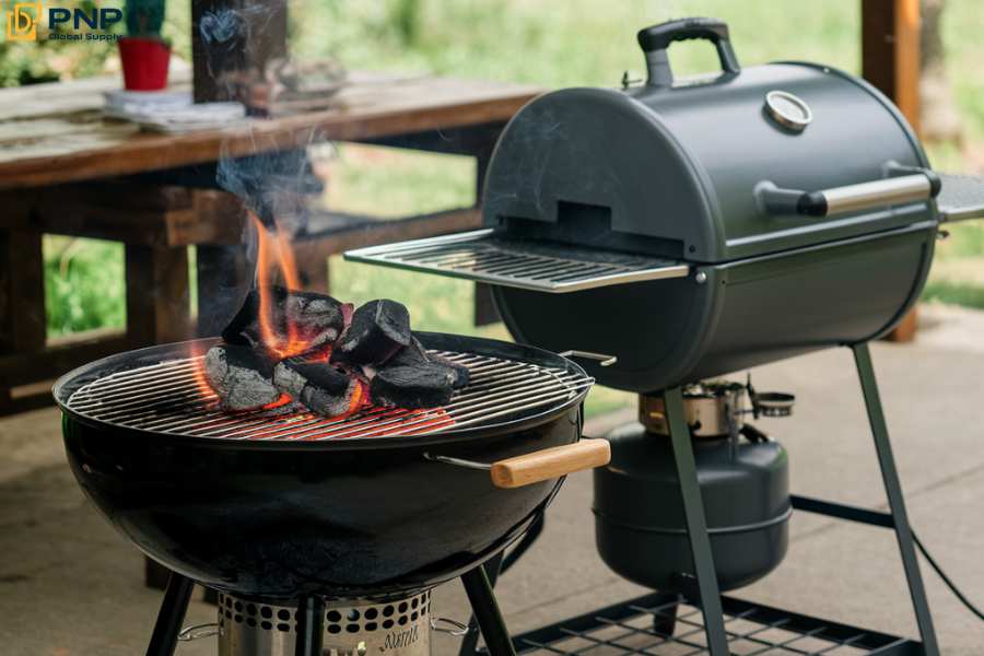 The charcoal grill uses charcoal as a fuel source while the gas grill uses gas as a fuel source