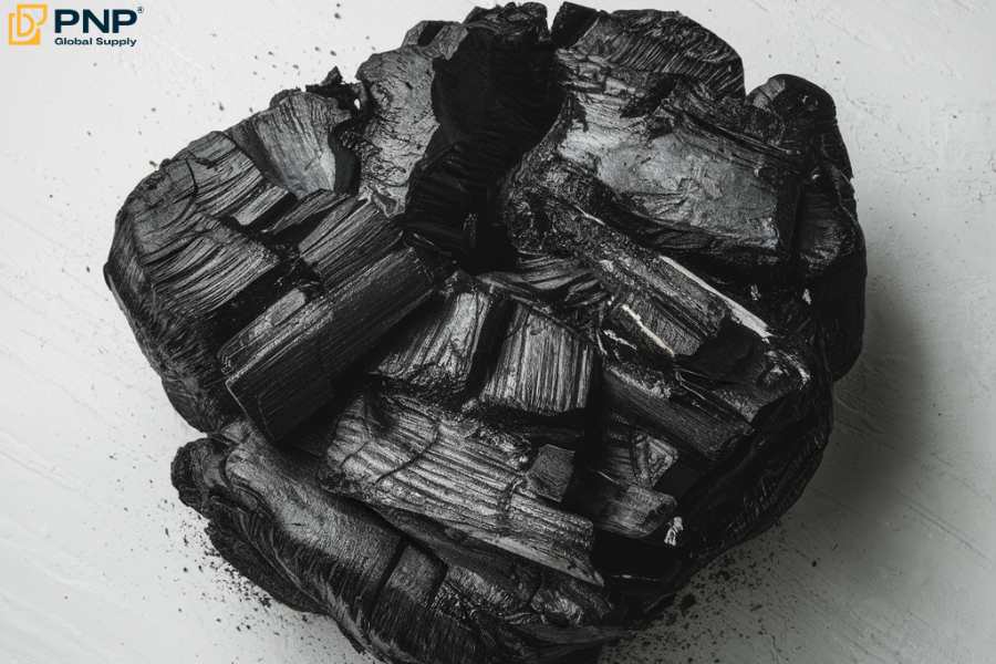 Lump charcoal composed of hardwood with irregular shape