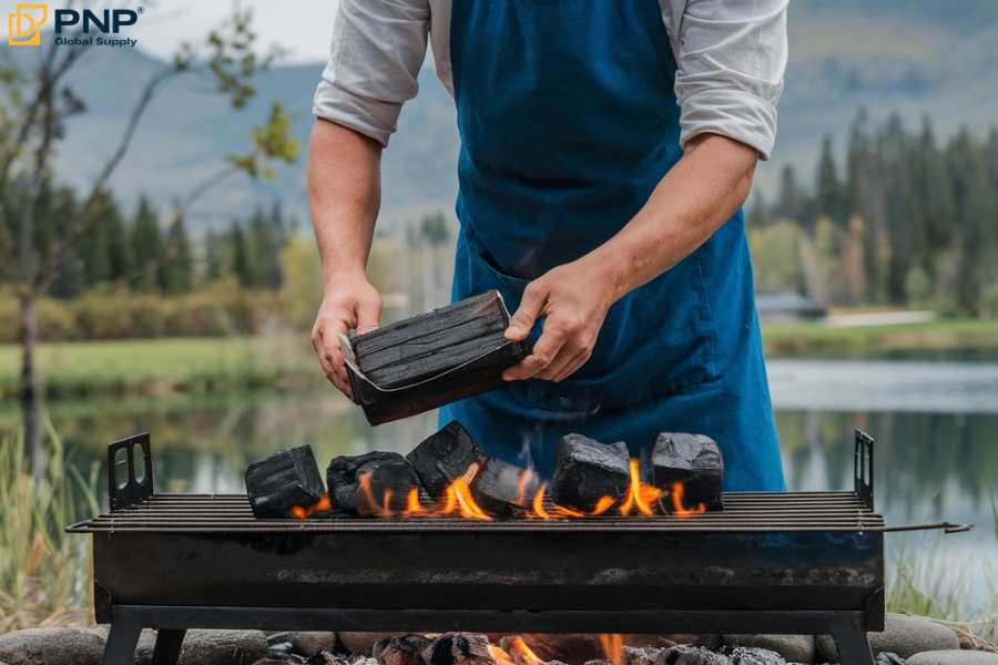 Arrange the charcoal briquettes to get fire in an efficient way