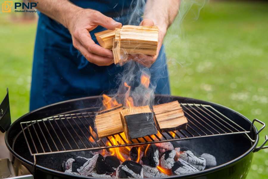 Add some wood chips in your charcoal grill to enhance your dish flavor