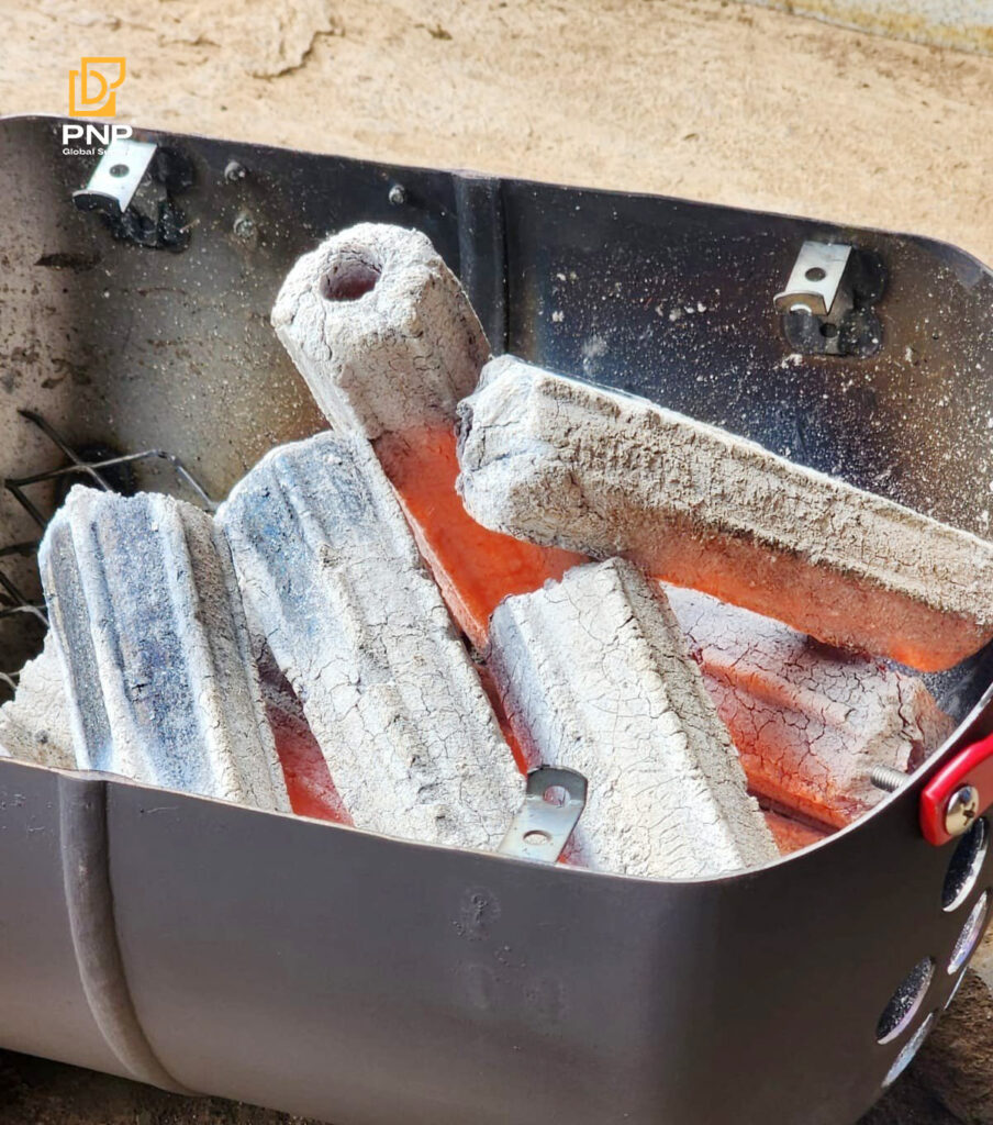 Sawdust charcoal burning produces consistent heat.