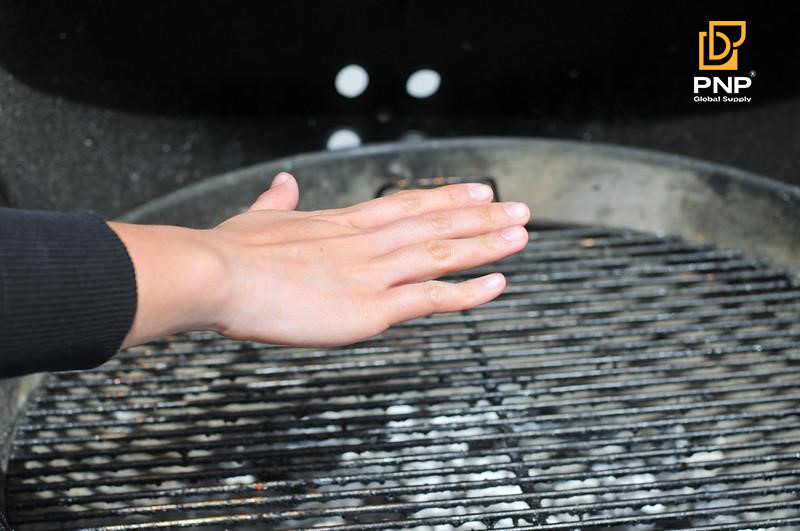 Use the hand test to check if the charcoal is ready