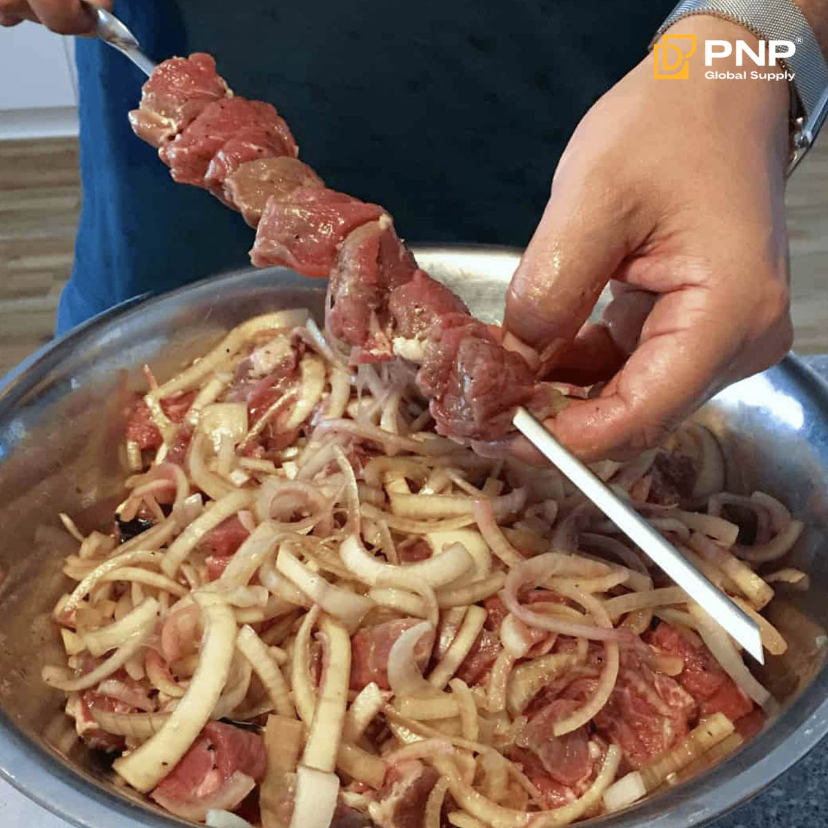 The Best Shashlik Recipe - Juicy Russian Shish Kebabs 3 Skewer the marinated meat.