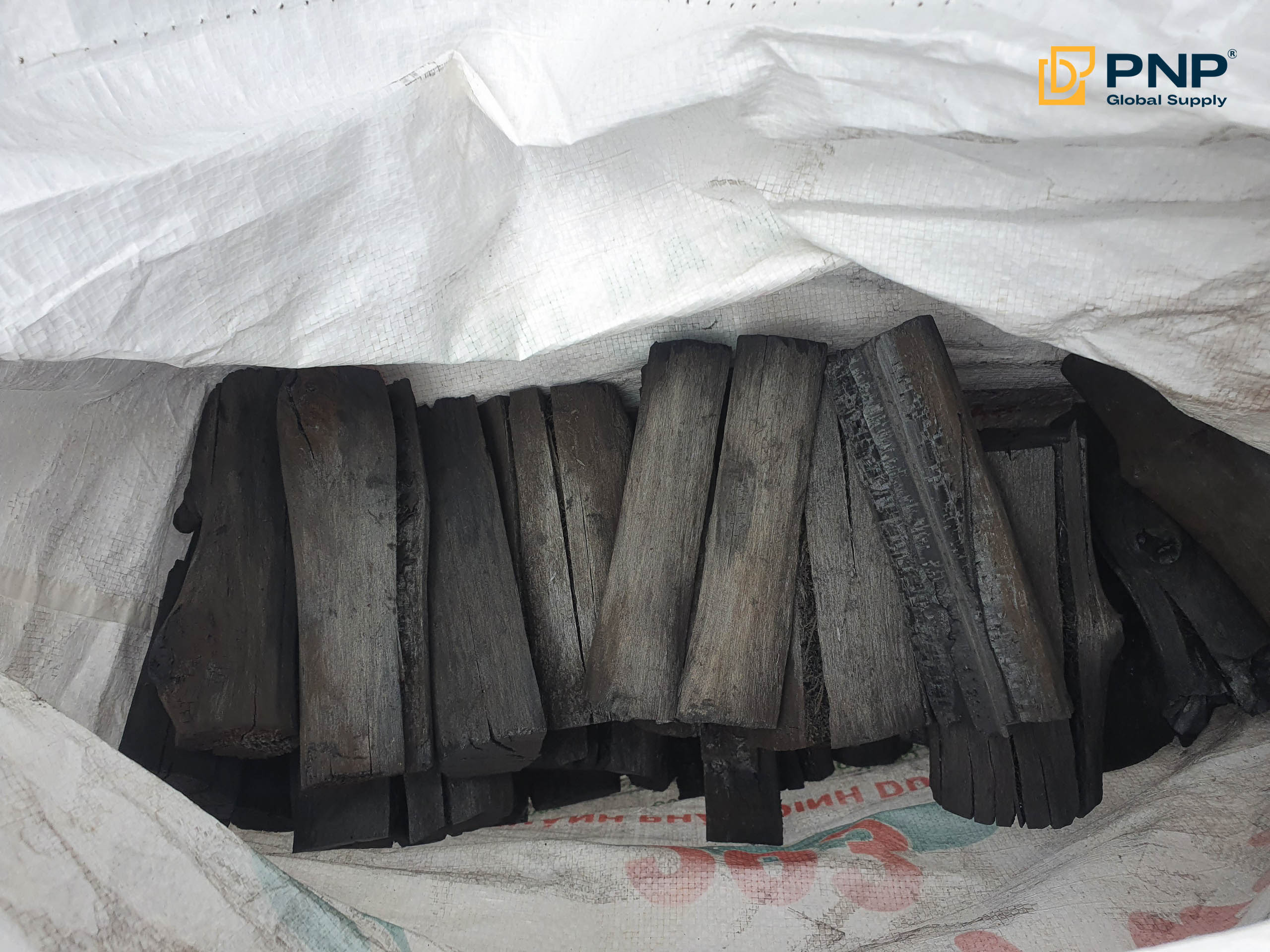 Charcoal packaging protects quality and supports export