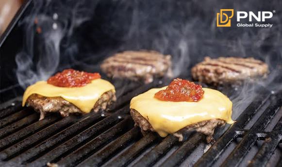 Charcoal helps create steady heat for grilling burgers