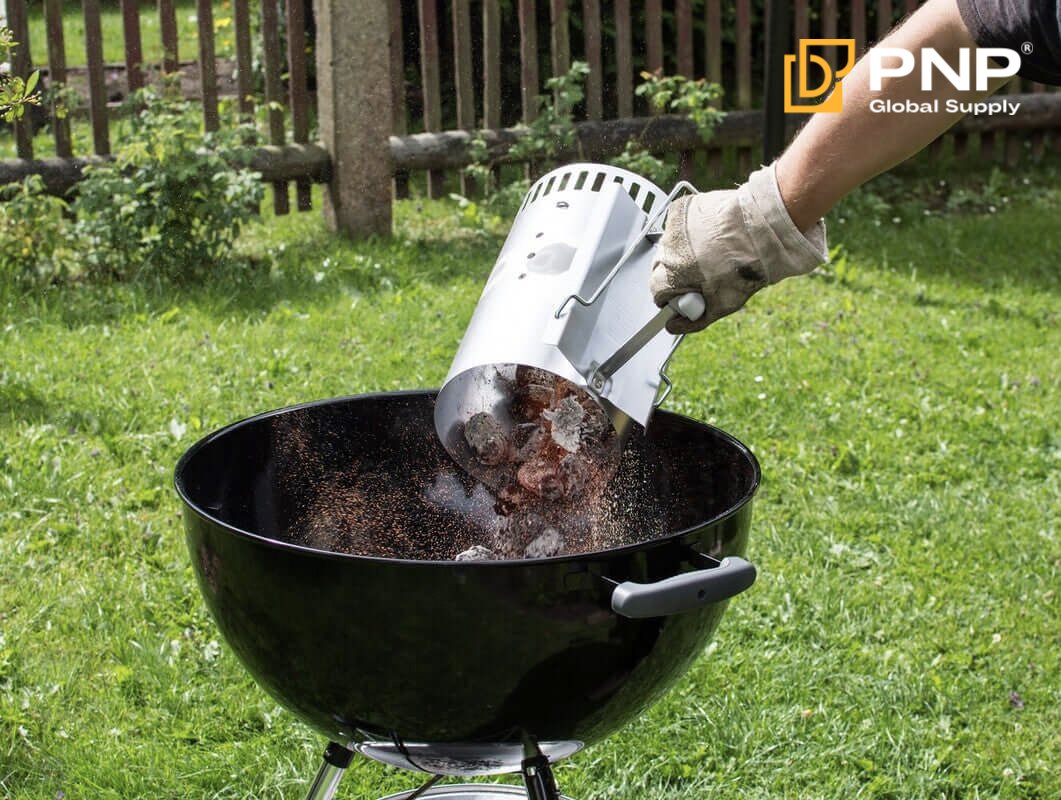 How to Light Charcoal with a Charcoal Chimney 1 Using a charcoal chimney helps light BBQ charcoal evenly without lighter fluid